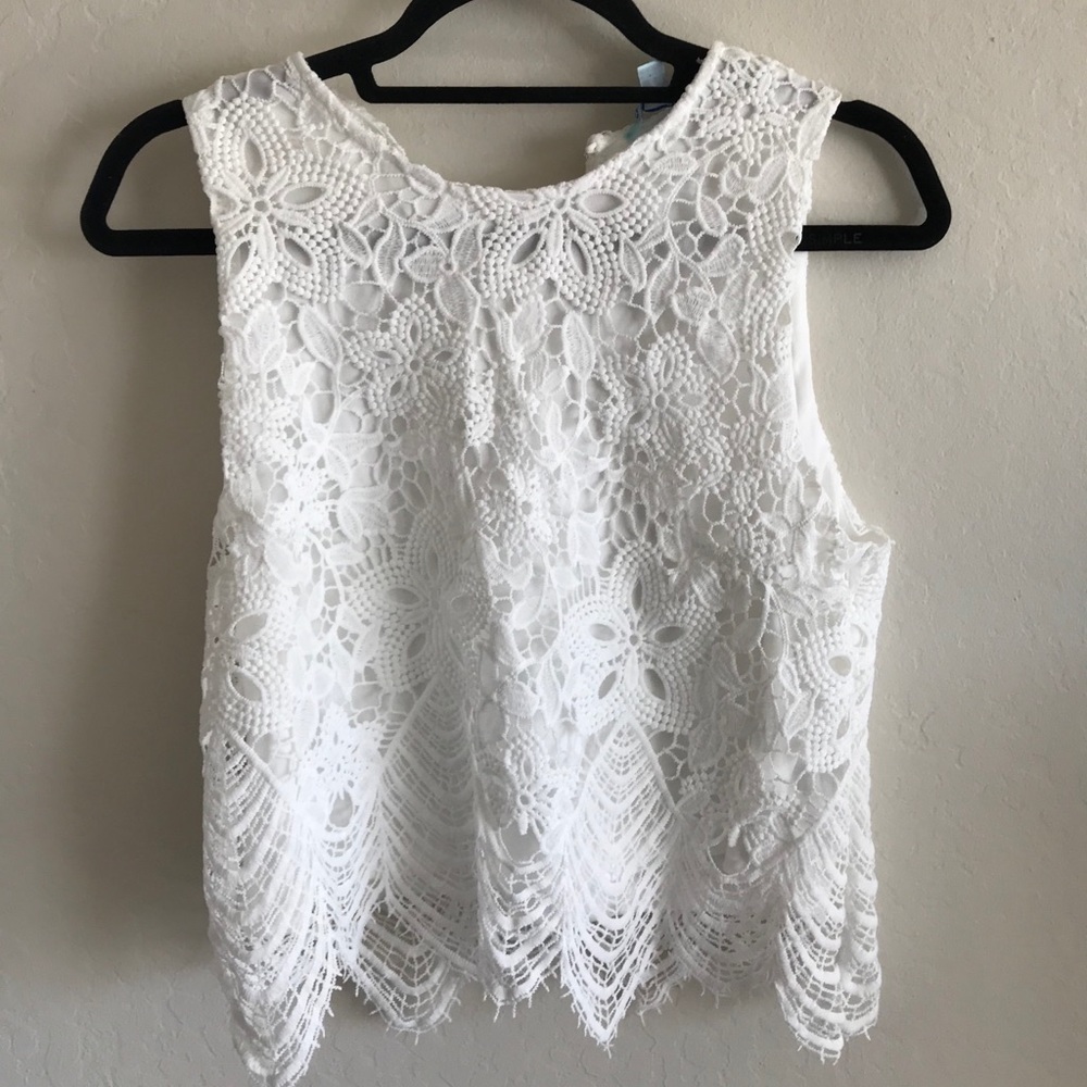 Cropped white sleeveless top